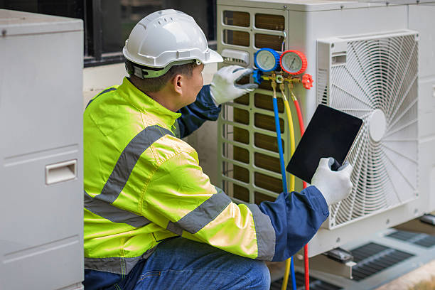 Professional Heat Pump Repair technician working in Shelby, MI